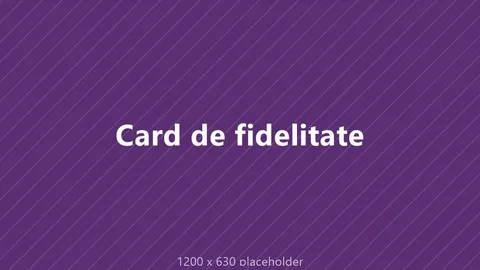 Card de fidelitate ținut lângă panoul de plată al unei spălătorii self-service